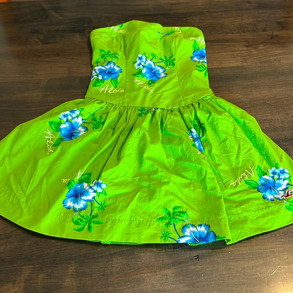 Strapless aloha style dress. Tags still on and never worn.